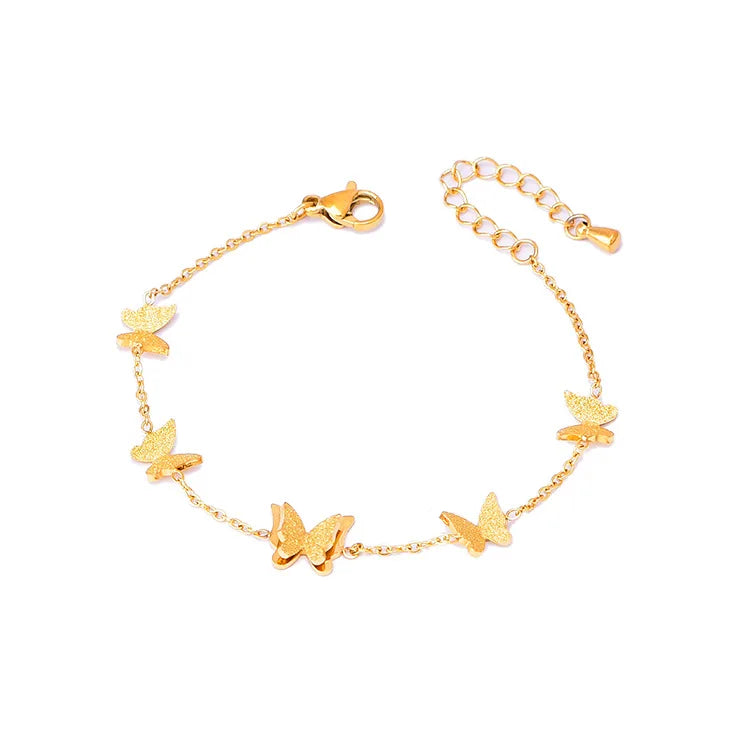 Lyra Elegantes Armband aus Edelstahl mit Anhängern