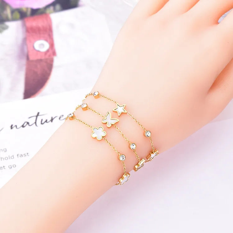 Lyra Elegantes Armband aus Edelstahl mit Anhängern