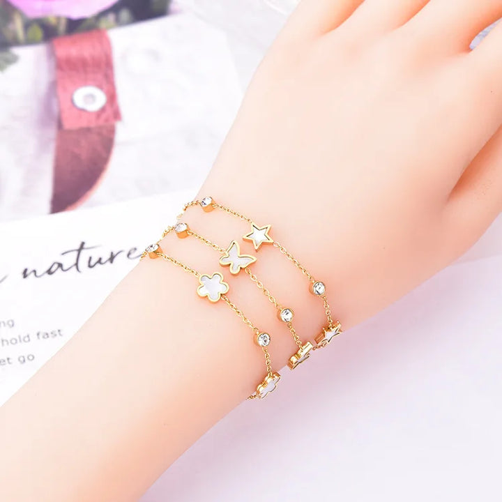 Lyra Elegantes Armband aus Edelstahl mit Anhängern