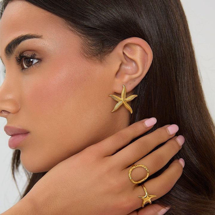 18K GOLDEN SEESTERNE OHRRINGE