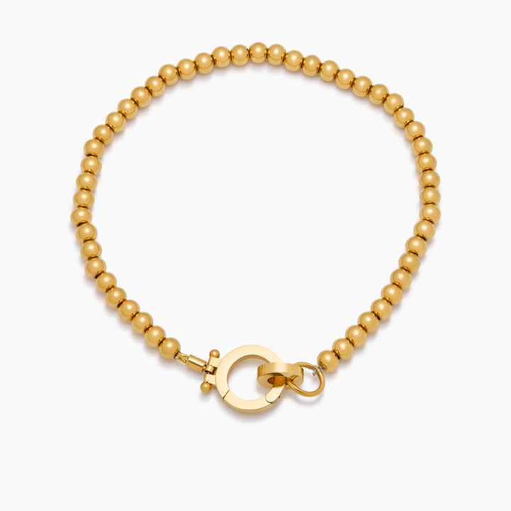 Essentielle goldene Perlenarmband