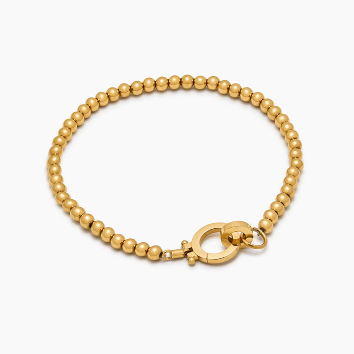 Essentielle goldene Perlenarmband