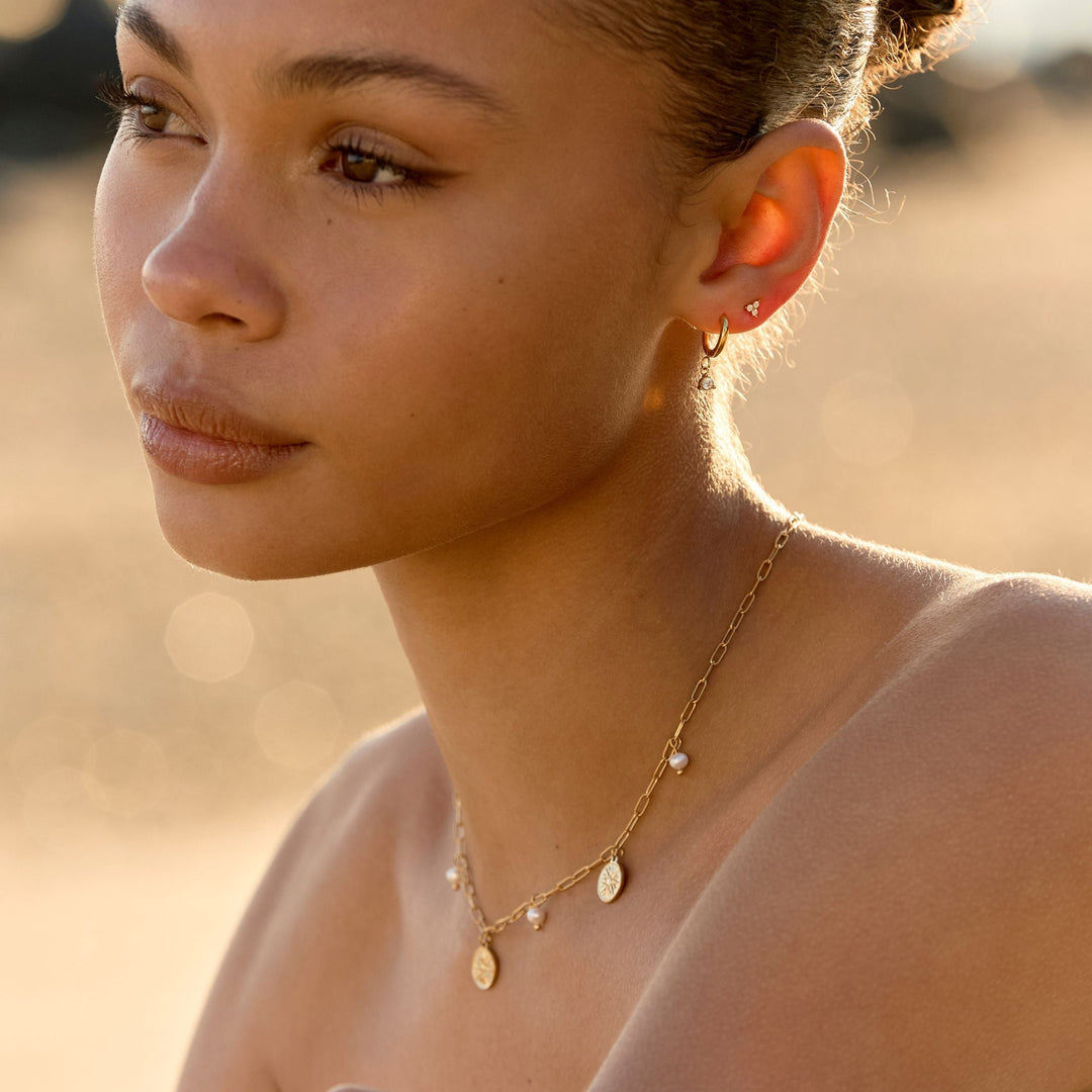 Glitzernde Tropfenohrringe