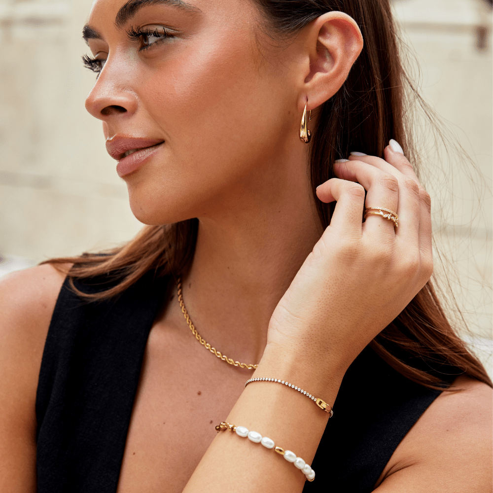 Niyah Weißer Kristall Goldarmband