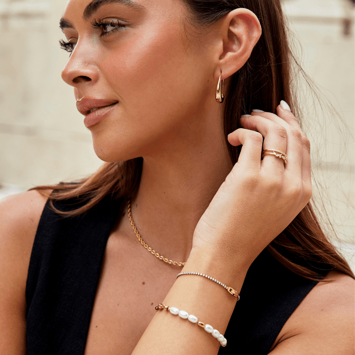 Niyah Weißer Kristall Goldarmband